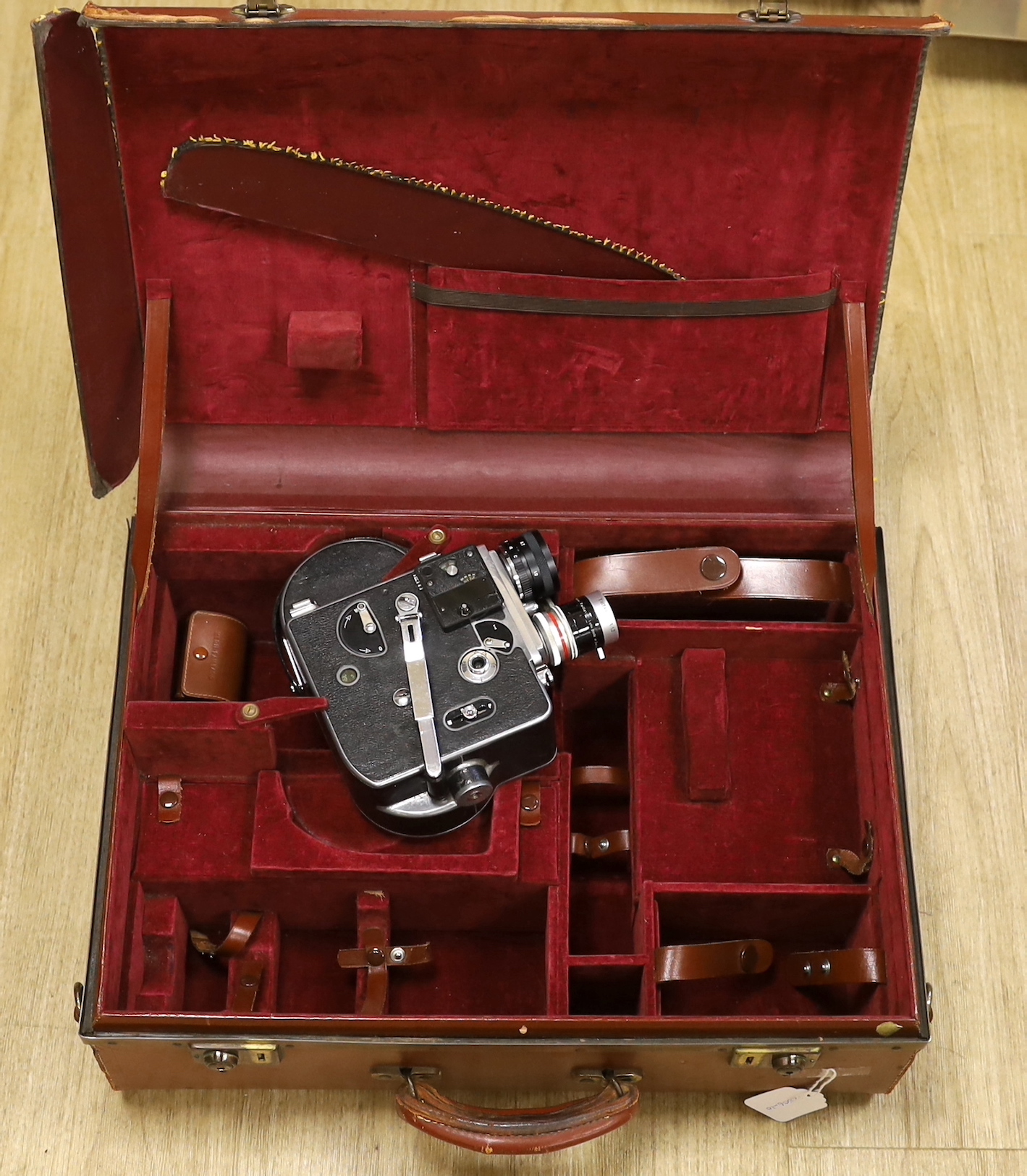 A Paillard Bolex H16 16mm cine camera in its case with lenses